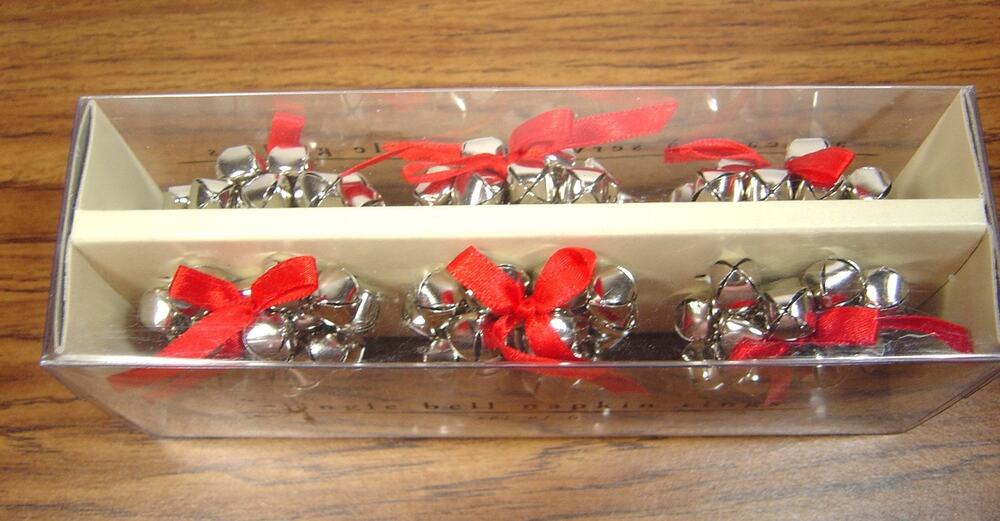 PIER 1 IMPORTS SET OF 6 SILVER TONE JINGLE BELL NAPKIN RINGS WITH RED BOWS
